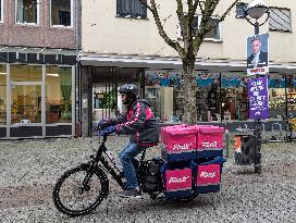 Flink Delivery Courier On E-Bike