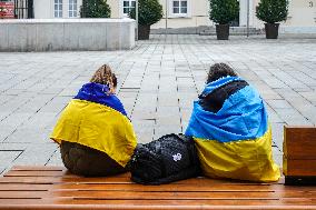 Two Women With Ukrainian Flags On Shoulders