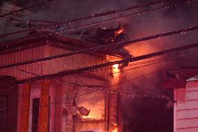 Firefighters Struggle To Put Out Fire In Three Homes On Woodside Avenue In Newark New Jersey Due To High Winds And Freezing Temp