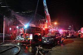 Firefighters Struggle To Put Out Fire In Three Homes On Woodside Avenue In Newark New Jersey Due To High Winds And Freezing Temp