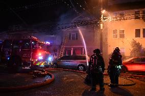 Firefighters Struggle To Put Out Fire In Three Homes On Woodside Avenue In Newark New Jersey Due To High Winds And Freezing Temp