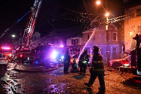 Firefighters Struggle To Put Out Fire In Three Homes On Woodside Avenue In Newark New Jersey Due To High Winds And Freezing Temp