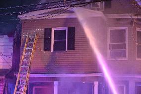 Firefighters Struggle To Put Out Fire In Three Homes On Woodside Avenue In Newark New Jersey Due To High Winds And Freezing Temp