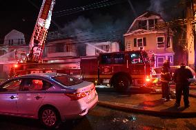 Firefighters Struggle To Put Out Fire In Three Homes On Woodside Avenue In Newark New Jersey Due To High Winds And Freezing Temp