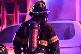 Firefighters Struggle To Put Out Fire In Three Homes On Woodside Avenue In Newark New Jersey Due To High Winds And Freezing Temp