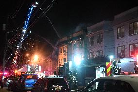 Firefighters Struggle To Put Out Fire In Three Homes On Woodside Avenue In Newark New Jersey Due To High Winds And Freezing Temp