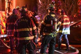 Firefighters Struggle To Put Out Fire In Three Homes On Woodside Avenue In Newark New Jersey Due To High Winds And Freezing Temp