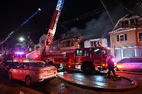 Firefighters Struggle To Put Out Fire In Three Homes On Woodside Avenue In Newark New Jersey Due To High Winds And Freezing Temp