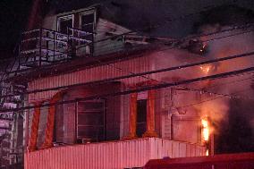 Firefighters Struggle To Put Out Fire In Three Homes On Woodside Avenue In Newark New Jersey Due To High Winds And Freezing Temp