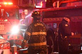 Firefighters Struggle To Put Out Fire In Three Homes On Woodside Avenue In Newark New Jersey Due To High Winds And Freezing Temp