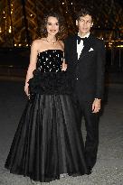 PFW Le Grand Diner du Louvre Arrivals Photocall