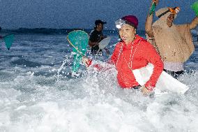 The Sasak People Gather To Catch Sea Worms Or Bau Nyale In Lombok, Indonesia.