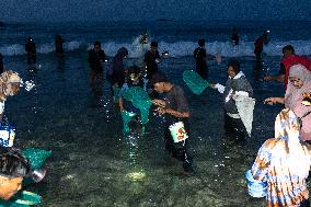 The Sasak People Gather To Catch Sea Worms Or Bau Nyale In Lombok, Indonesia.