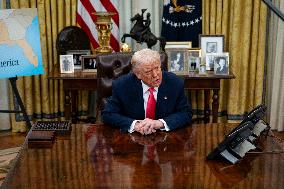 US President Donald Trump Signs Executive Order Pausing USMCA Tariffs