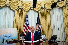 US President Donald Trump Signs Executive Order Pausing USMCA Tariffs