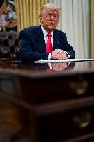 US President Donald Trump Signs Executive Order Pausing USMCA Tariffs