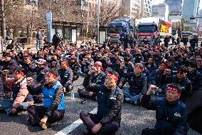 Truckers And Construction Workers Rally In Seoul For Labor Rights And Presidential Impeachment