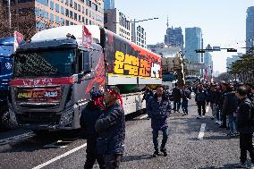 Truckers And Construction Workers Rally In Seoul For Labor Rights And Presidential Impeachment