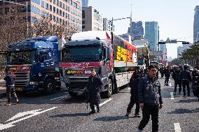 Truckers And Construction Workers Rally In Seoul For Labor Rights And Presidential Impeachment