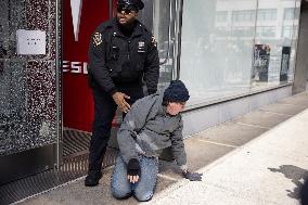 Hundreds Protest At Manhattan Tesla Showroom; Six Arrests