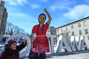 Protesters Rally Outside U.S. Embassy On International Women's Day In Ottawa