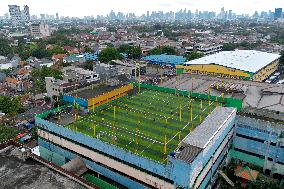 Mini Soccer Field On Building Rooftop In Jakarta