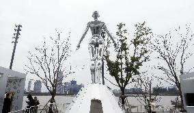 Japanese Artist Hajime Sorayama's Sexy Robot Metal Sculpture
