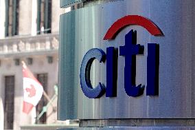 Signage For American And Canadian Banking Institutions In Downtown Toronto