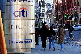 Signage For American And Canadian Banking Institutions In Downtown Toronto