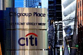Signage For American And Canadian Banking Institutions In Downtown Toronto
