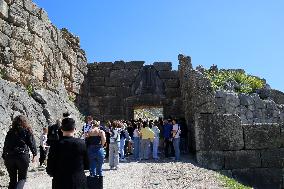 Tourists Visiting The Archaeological Site Of Mycenae.