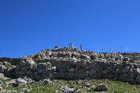 Tourists Visiting The Archaeological Site Of Mycenae.