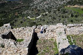 Tourists Visiting The Archaeological Site Of Mycenae.