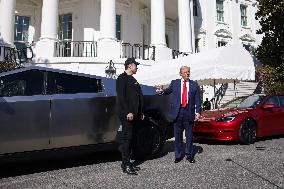 DC: President Trump views Tesla vehicles in Front of The White House