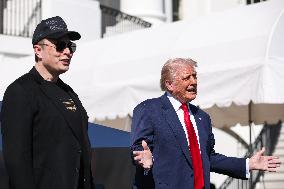 DC: President Trump views Tesla vehicles in Front of The White House