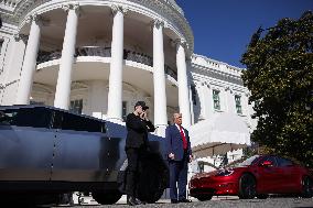 DC: President Trump views Tesla vehicles in Front of The White House
