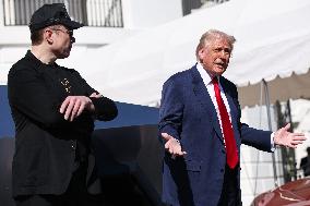 DC: President Trump views Tesla vehicles in Front of The White House