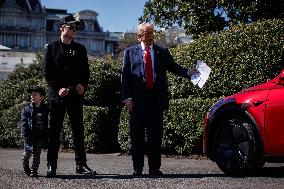 DC: President Trump views Tesla vehicles in Front of The White House