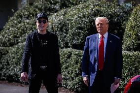 DC: President Trump views Tesla vehicles in Front of The White House