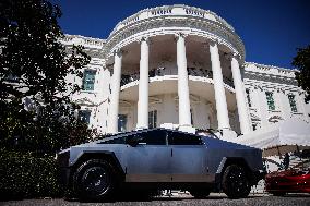DC: President Trump views Tesla vehicles in Front of The White House