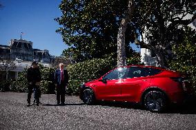 DC: President Trump views Tesla vehicles in Front of The White House
