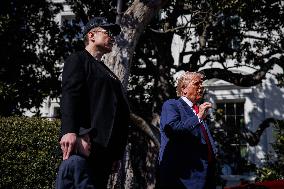 DC: President Trump views Tesla vehicles in Front of The White House