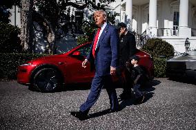 DC: President Trump views Tesla vehicles in Front of The White House