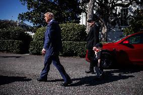 DC: President Trump views Tesla vehicles in Front of The White House