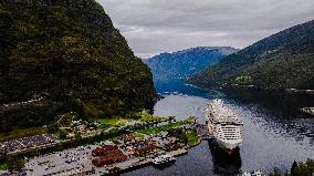 Aerial View of a Cruise Ship Docked in Flåm, Norway