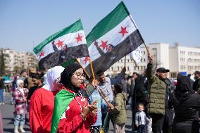 Syrians Mark The 14th Anniversary Of The Revolution In Damascus