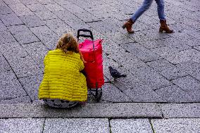 Shopper Sitting With Cart