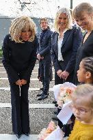 Brigitte Macron and Queen Mary Visit Paris Nursery School