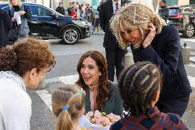 Brigitte Macron and Queen Mary Visit Paris Nursery School