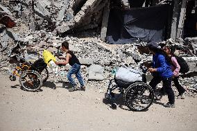 Palestinians Flee The Shuja'iyya Neighborhood